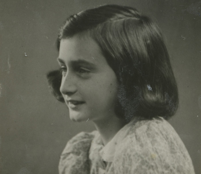 A 1939 passport photo of Anne Frank, May 1939. (Photo collection Anne Frank House, Amsterdam)