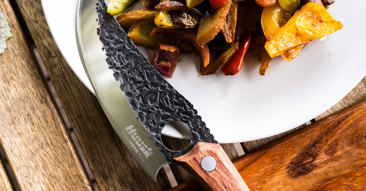 Knife with chopped vegetables 
