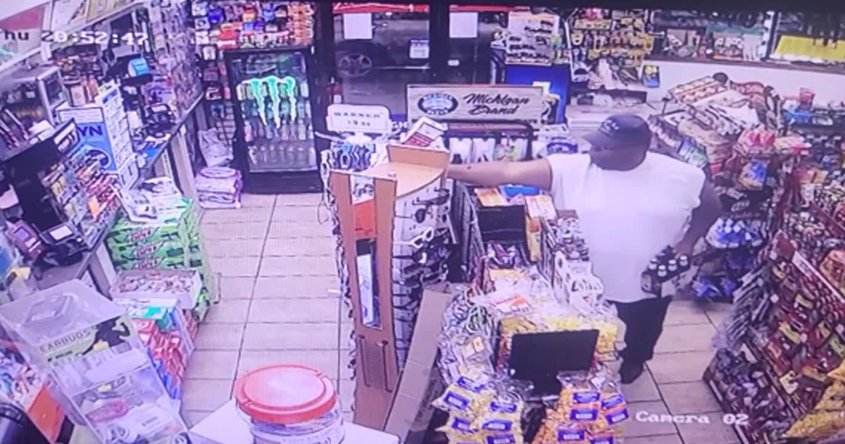 Concealed Carrier Holding 6-Pack of Beer Shoots Armed Robber